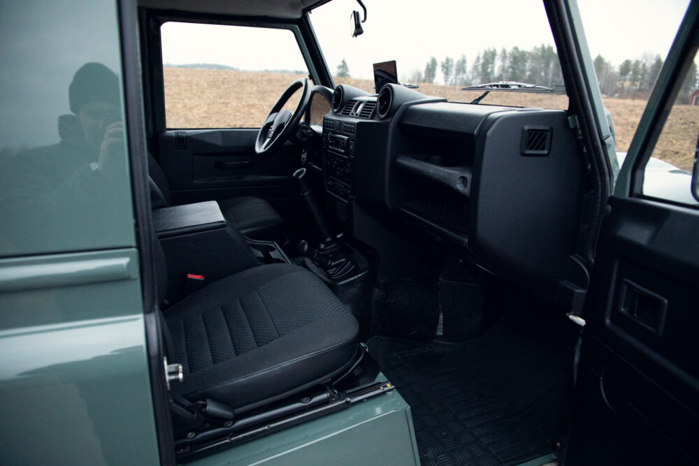 Interior view of a modern car with open door