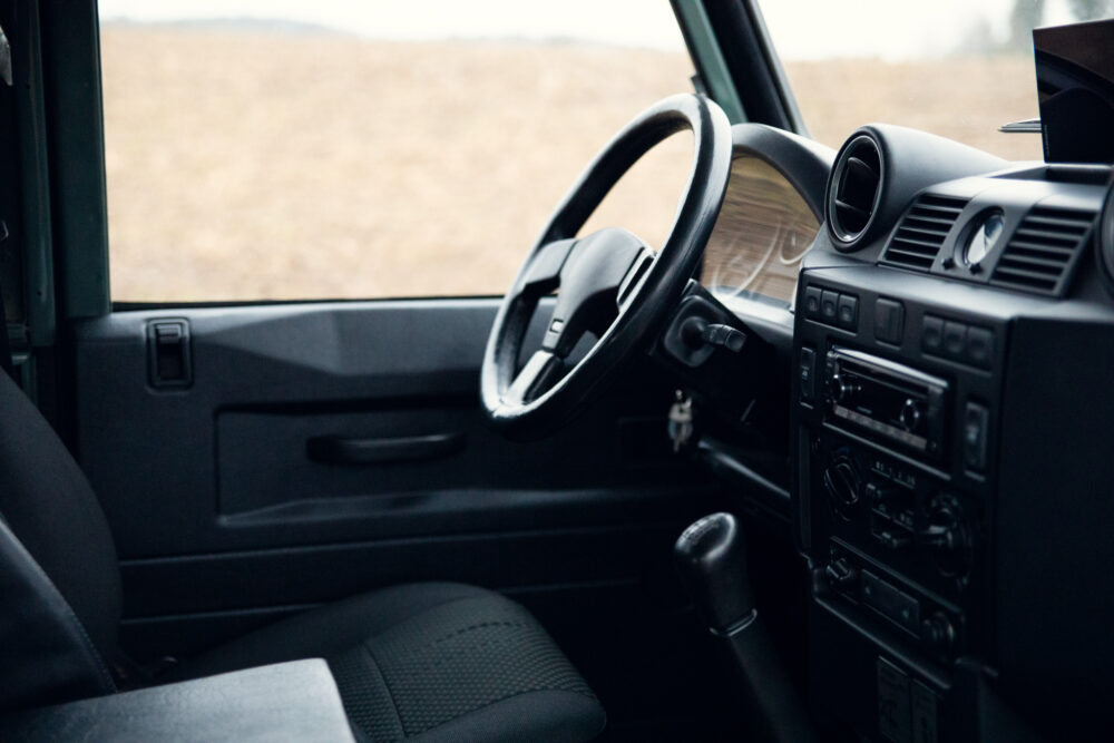 Interior view of a modern car dashboard and steering wheel