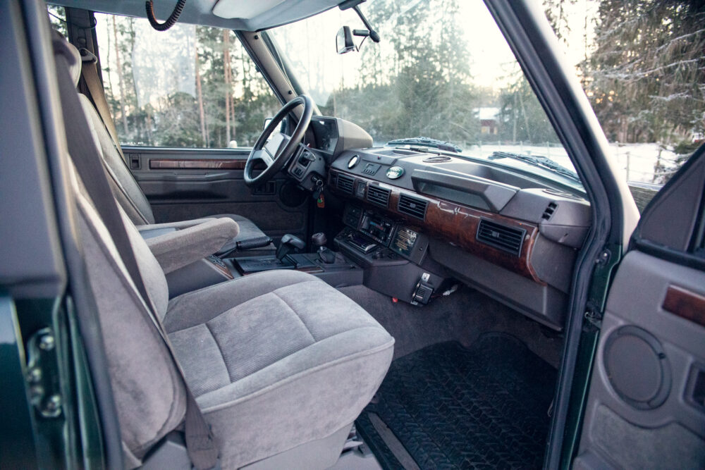 Vintage car interior with snowy landscape outside