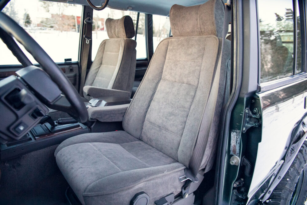 Interior view of vintage car with gray seats