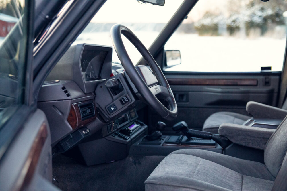 Vintage car interior with snowy view outside