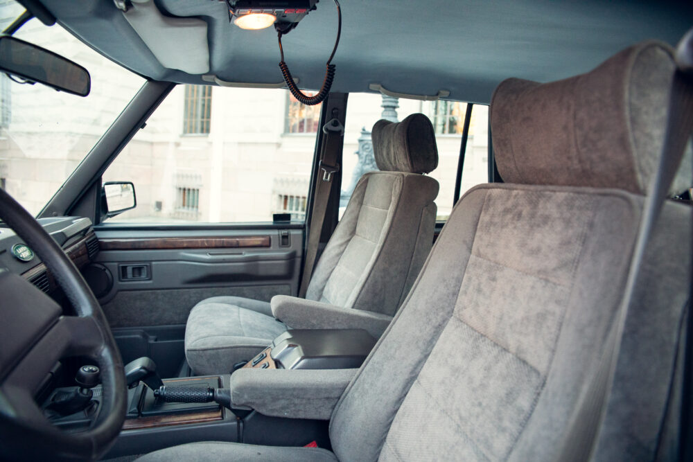 Classic car interior with gray fabric seats