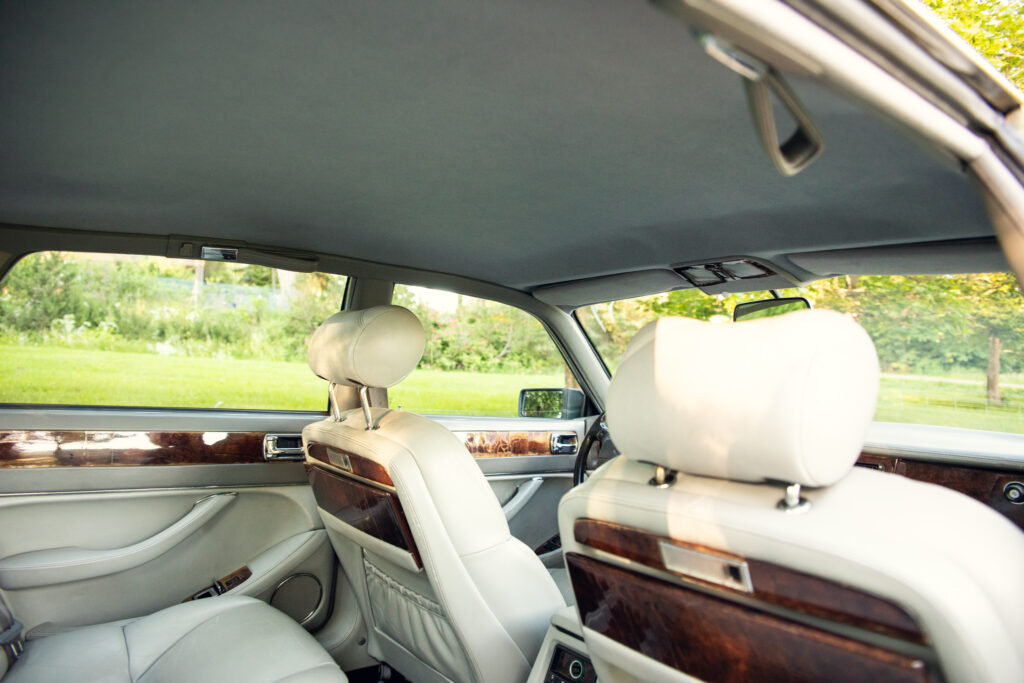 Luxury car interior with beige leather seats