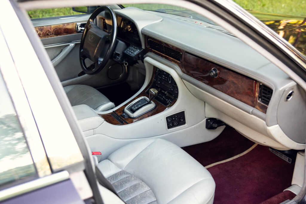 Luxury car interior with leather seats and wood trim