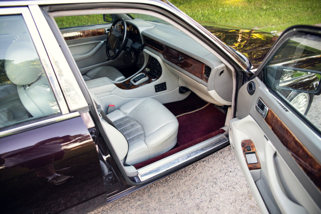 Luxury car interior with leather seats and wood trim