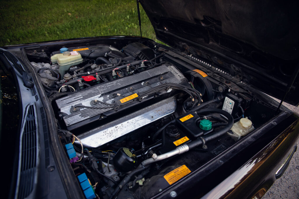 Open hood showing Jaguar 4.0 engine bay