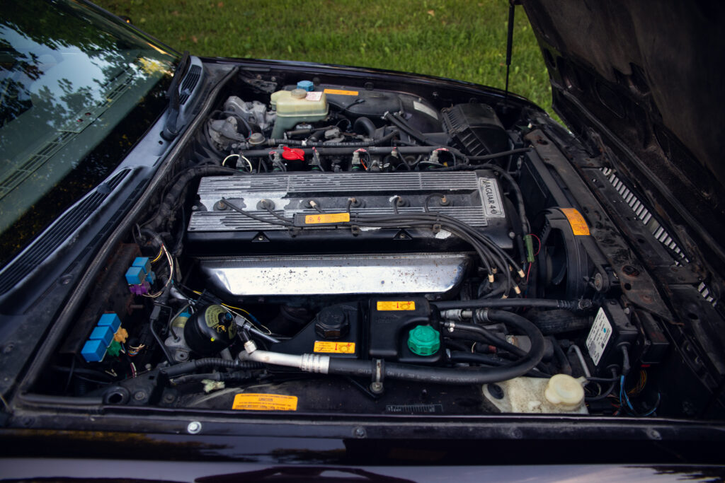 Open hood revealing Jaguar 4.0 engine bay