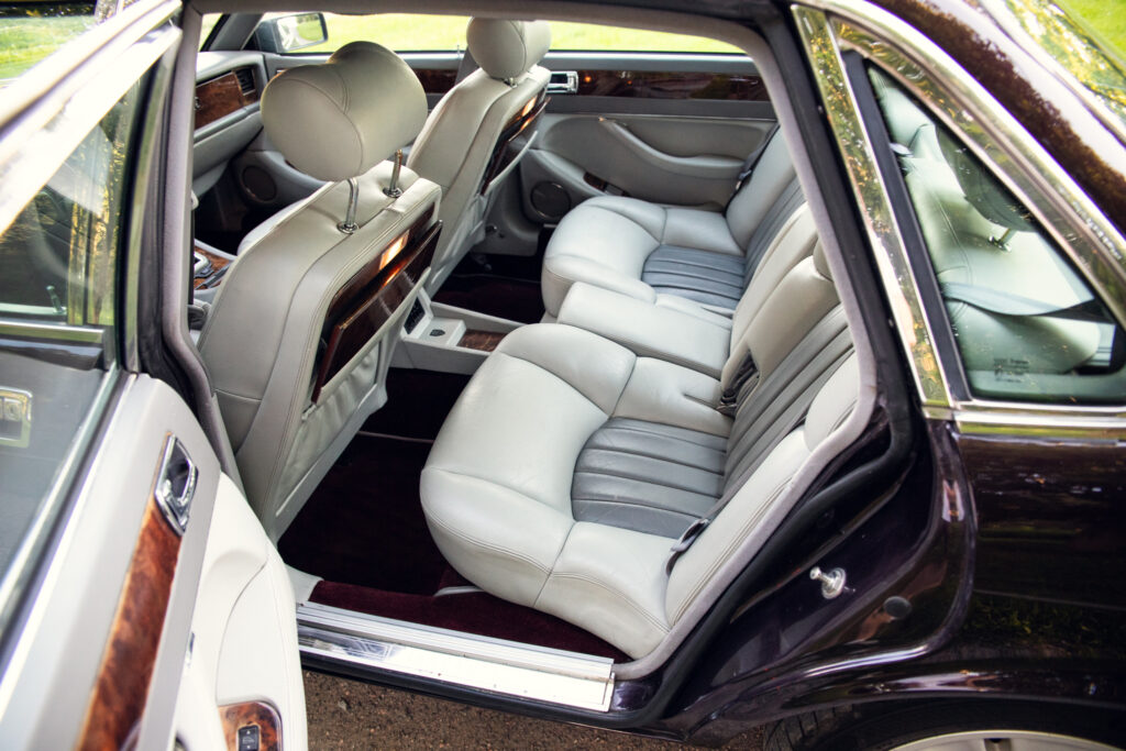 Luxury sedan rear seats with leather interior