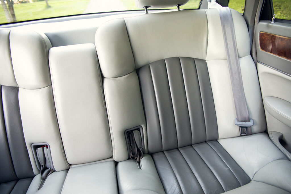 Light gray leather car back seat interior