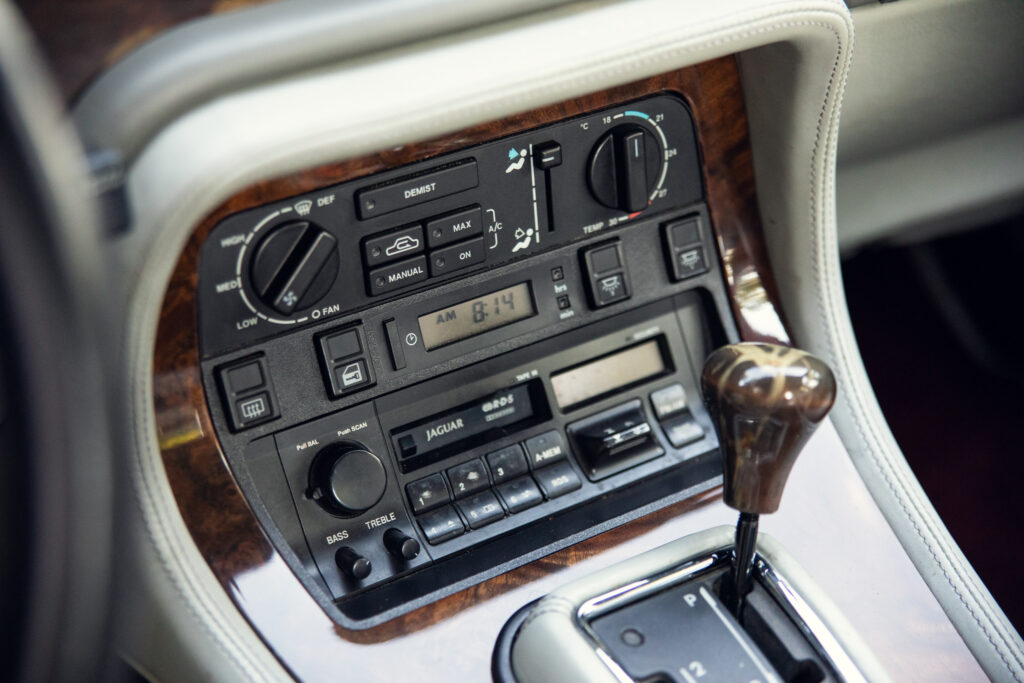 Jaguar center console with wood trim and controls