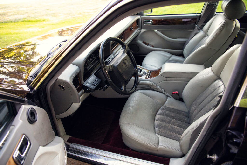 Luxury car interior with beige leather seats