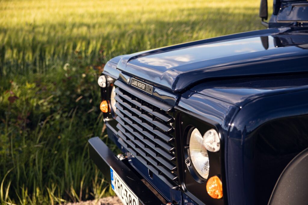 Front grille of blue Land Rover 90