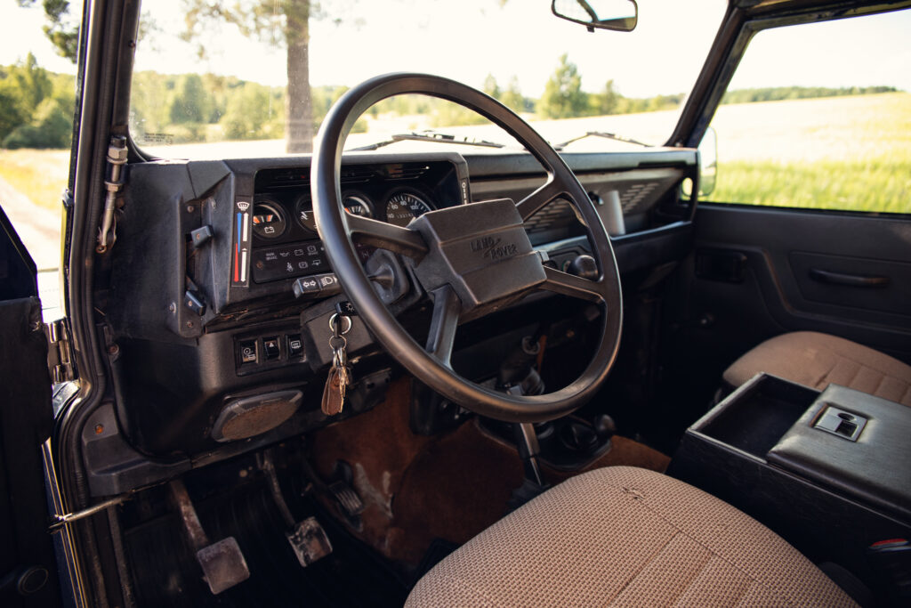Vintage Land Rover interior with steering wheel