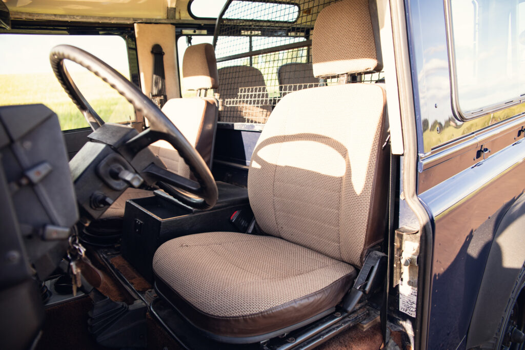 Interior of rugged off-road vehicle driver seat