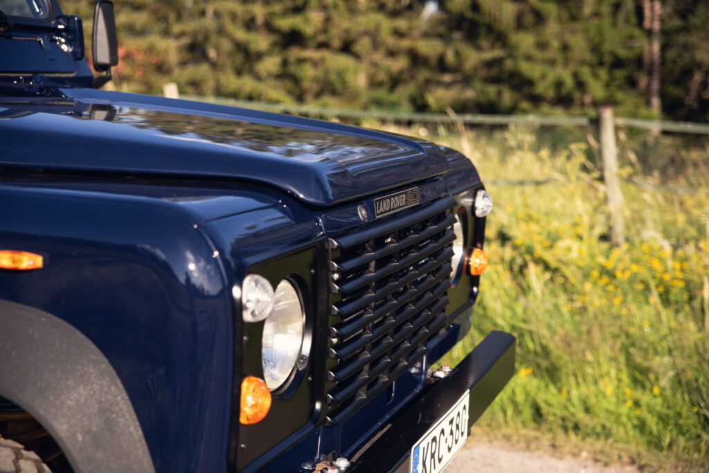 Close-up of blue Land Rover front grille