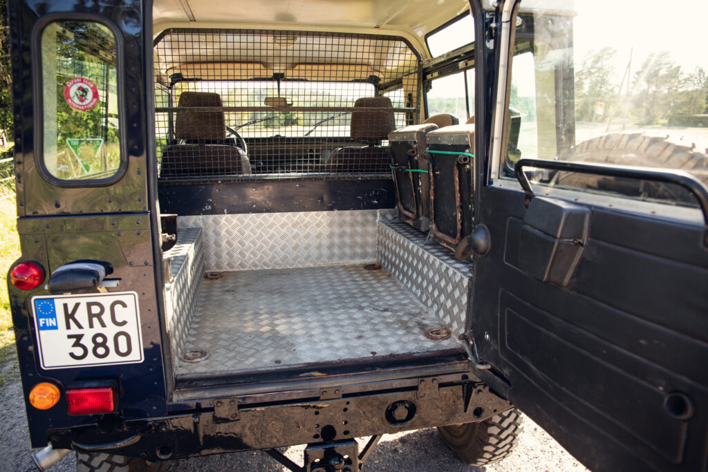 Open rear cargo area of rugged SUV