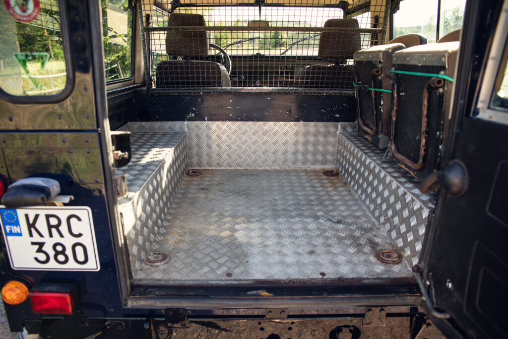 Metal-lined cargo area of rugged off-road vehicle