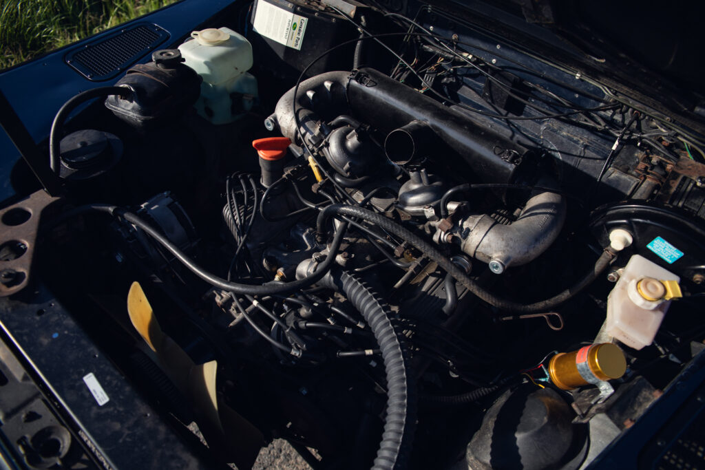 Classic car engine bay with exposed components