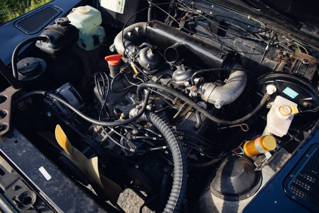 Classic car engine bay with visible components