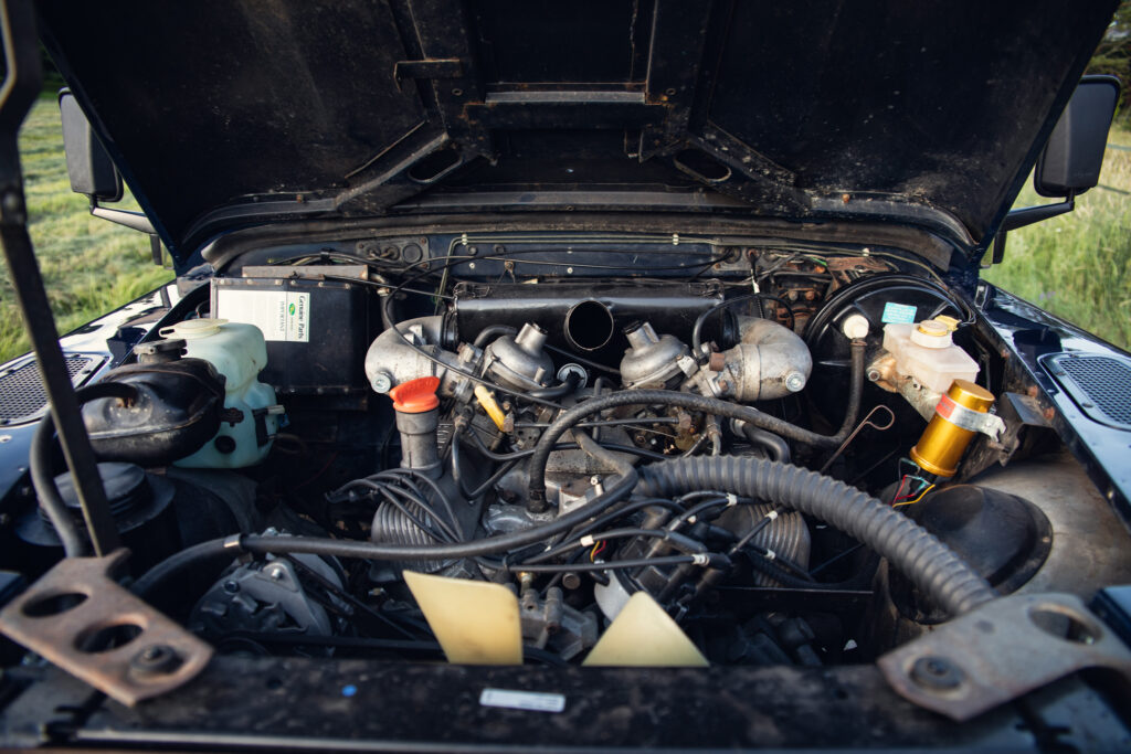 Car engine under open hood