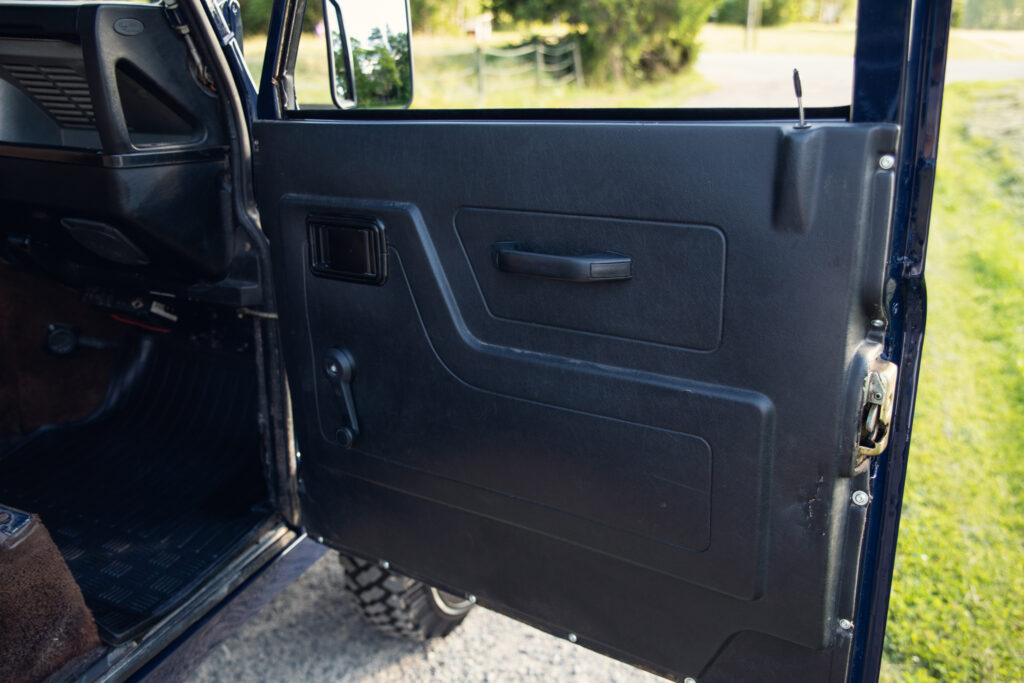 Interior of black vehicle door panel