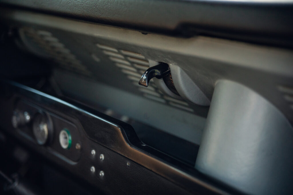 Close-up of vehicle dashboard vent lever