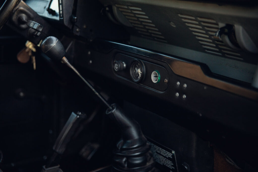 Vintage car dashboard with manual gear shift