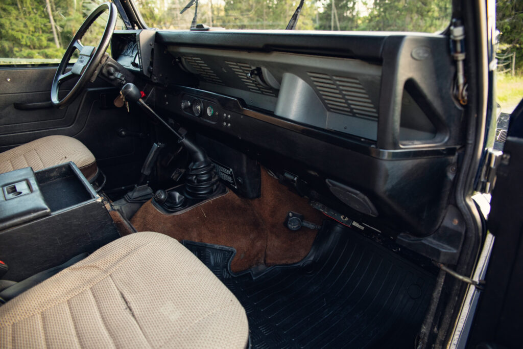 Vintage off-road vehicle interior with manual gear shift
