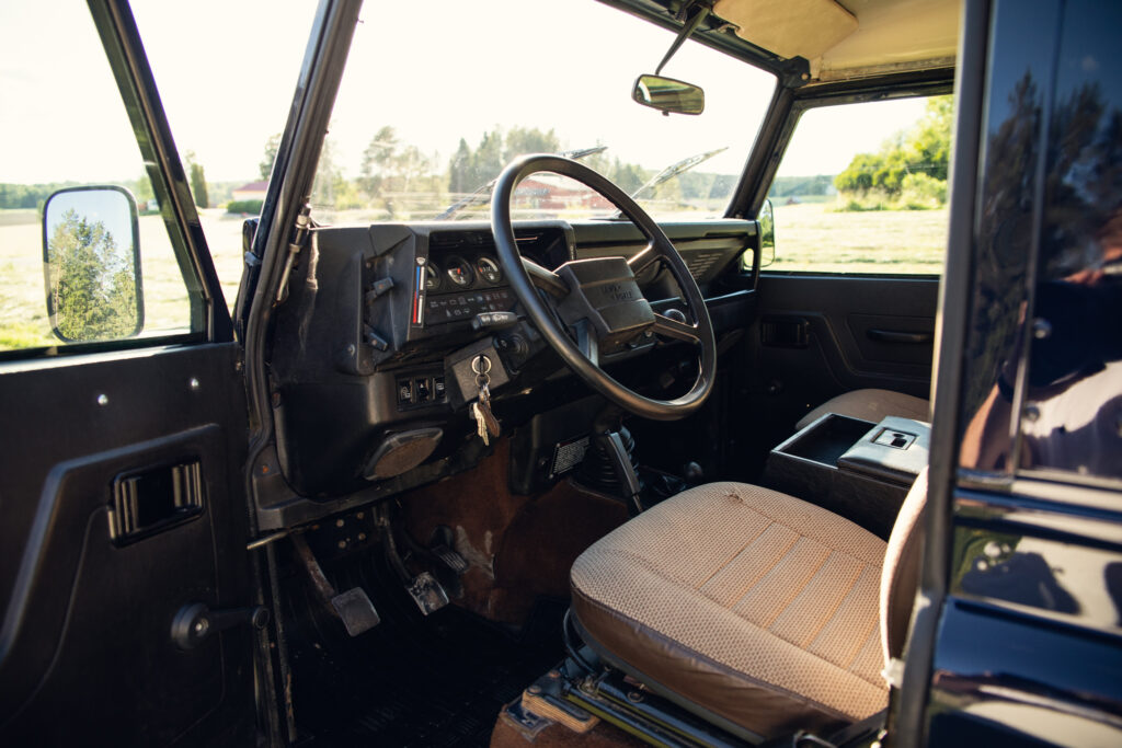 Interior of rugged off-road vehicle driver’s seat