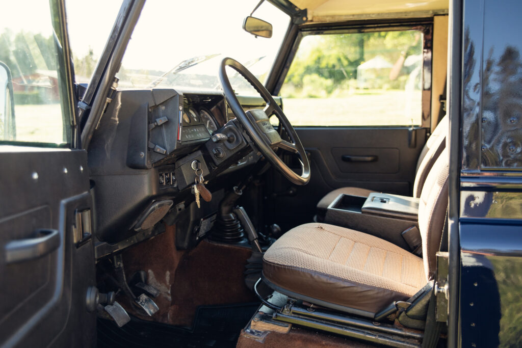 Interior of vintage off-road vehicle with manual controls