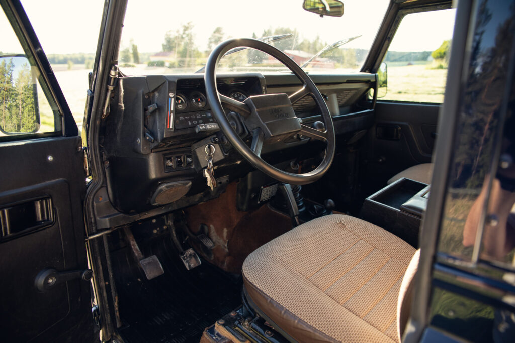 Interior of vintage off-road vehicle with manual controls