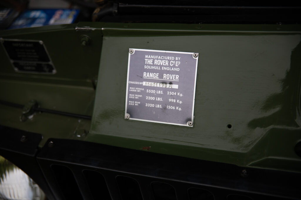 Range Rover manufacturer plate on green vehicle