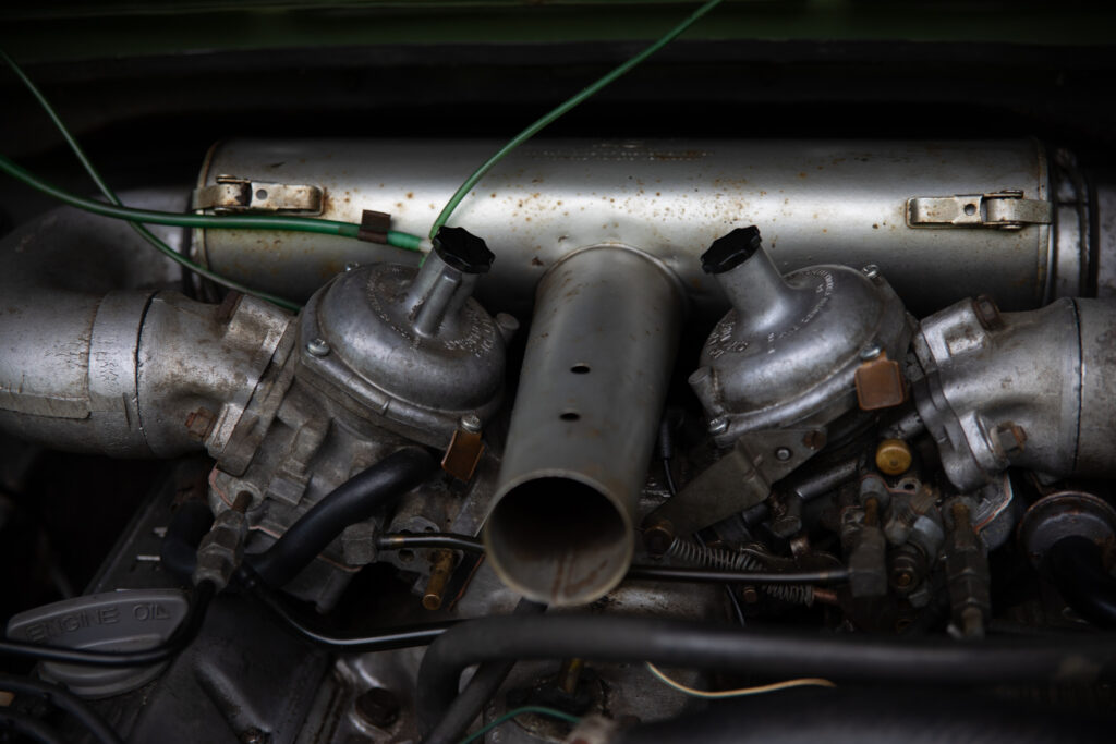 Close-up of vintage car engine carburetors
